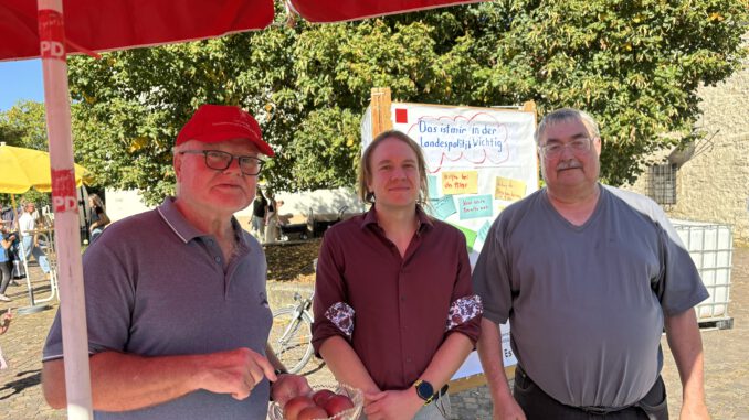 Helfer am Stand